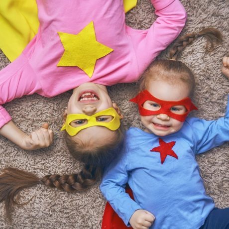 children are playing superhero
